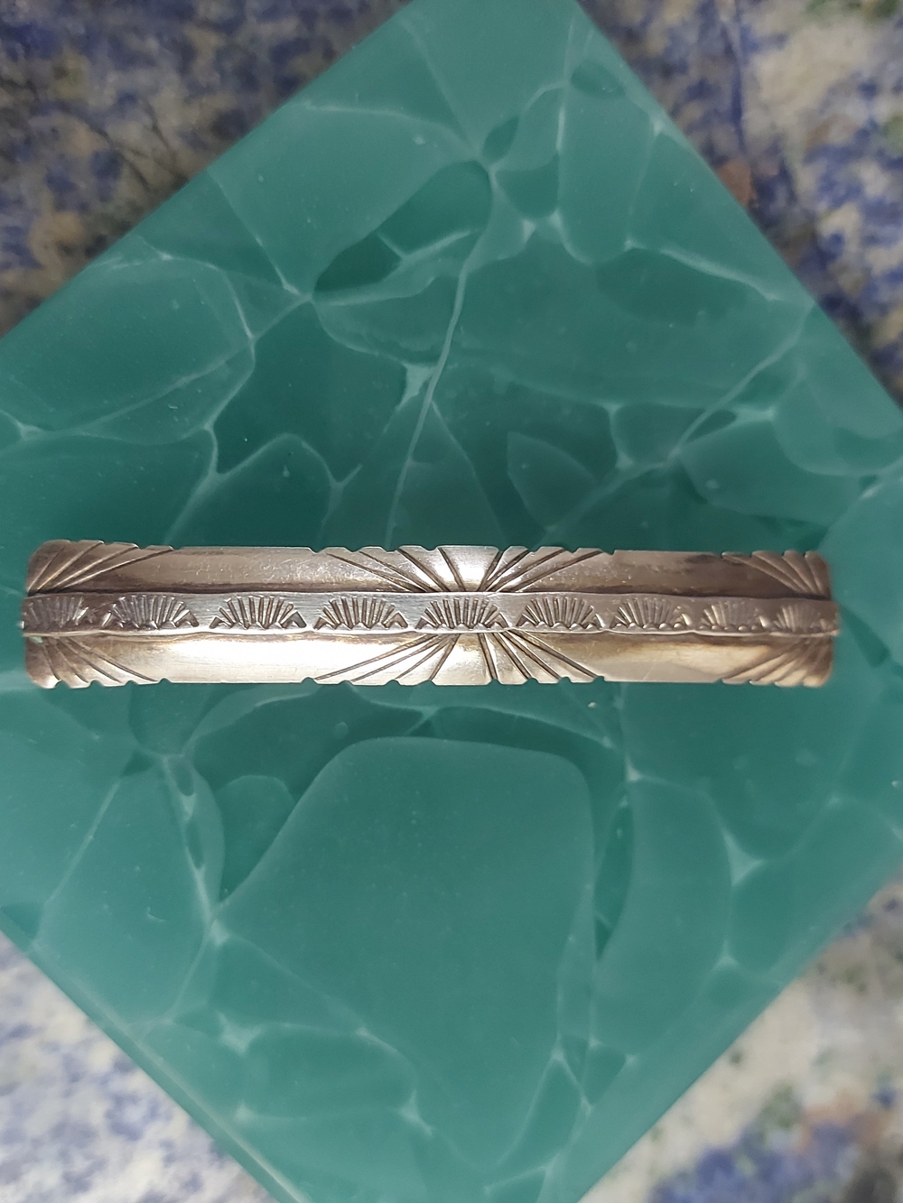 Engraved Silver-Tone Bangle Bracelet with Radiant Motif - Silver